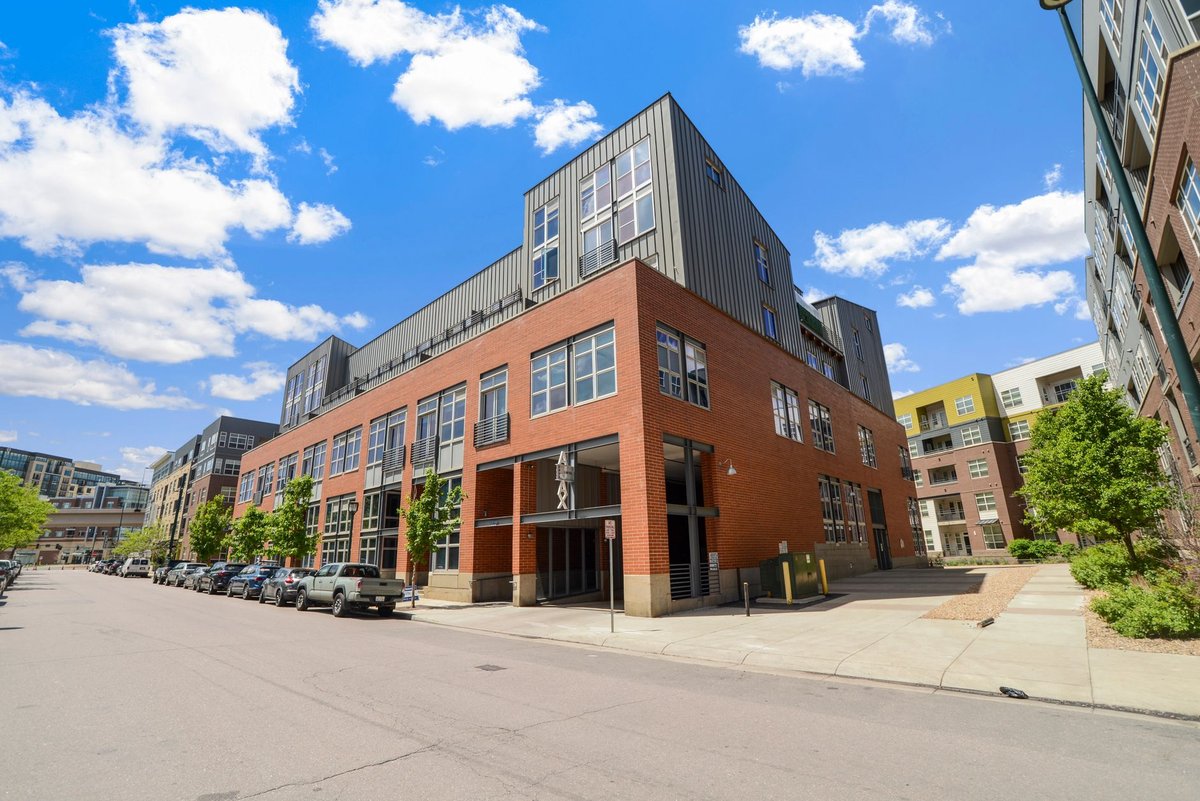 a rooftop patio overlooking downtown Denver in LoHi