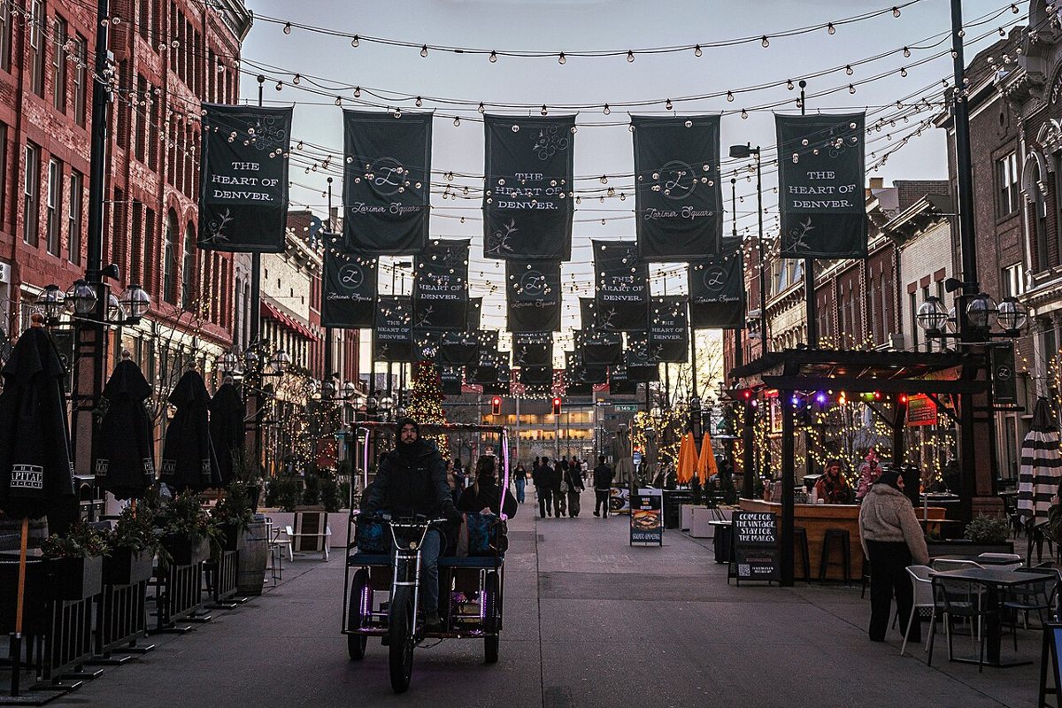 String lights over patios on Larimer Square in downtown Denver